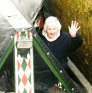 Sonia on board 'Heron', descending the Foxton lock during the 2010 Tom Rolt centenary celebrations photo of Sonia on a canal boat in 2010